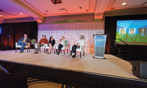 Participants attending a panel 